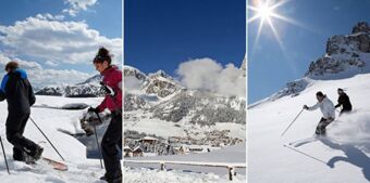 スキーヤーのいる冬景色、雪に覆われた山々、谷間の村。