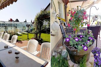 Outdoor seating area with white plastic chairs, flower pots, green lawn, and glass sunroom at G&auml;stehaus Rita