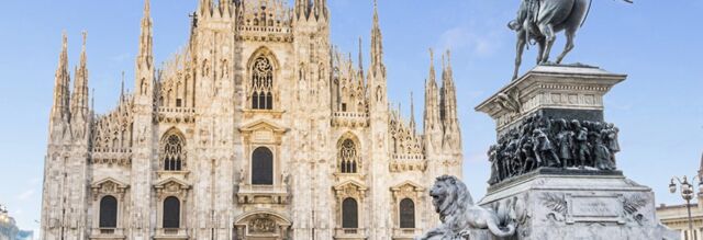 The Milan Cathedral with intricate gothic architecture and the equestrian statue in Piazza del Duomo in front of Nhow Milano