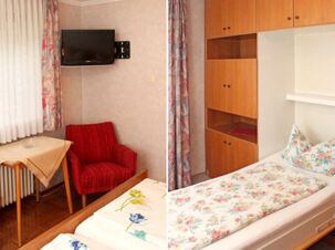 Bedroom at Pension Graml Fr&uuml;hst&uuml;ckspension with single beds, floral bedding, wooden wardrobe, red armchair, small table, and wall-mounted TV