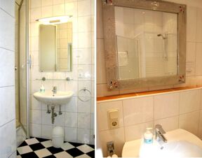 Helles Badezimmer mit Waschbecken, Spiegel und Dusche im Hotel-G&auml;stehaus Br&uuml;ggemann, klar und sauber gestaltet mit wei&szlig;-schwarzem Fliesenmuster.
